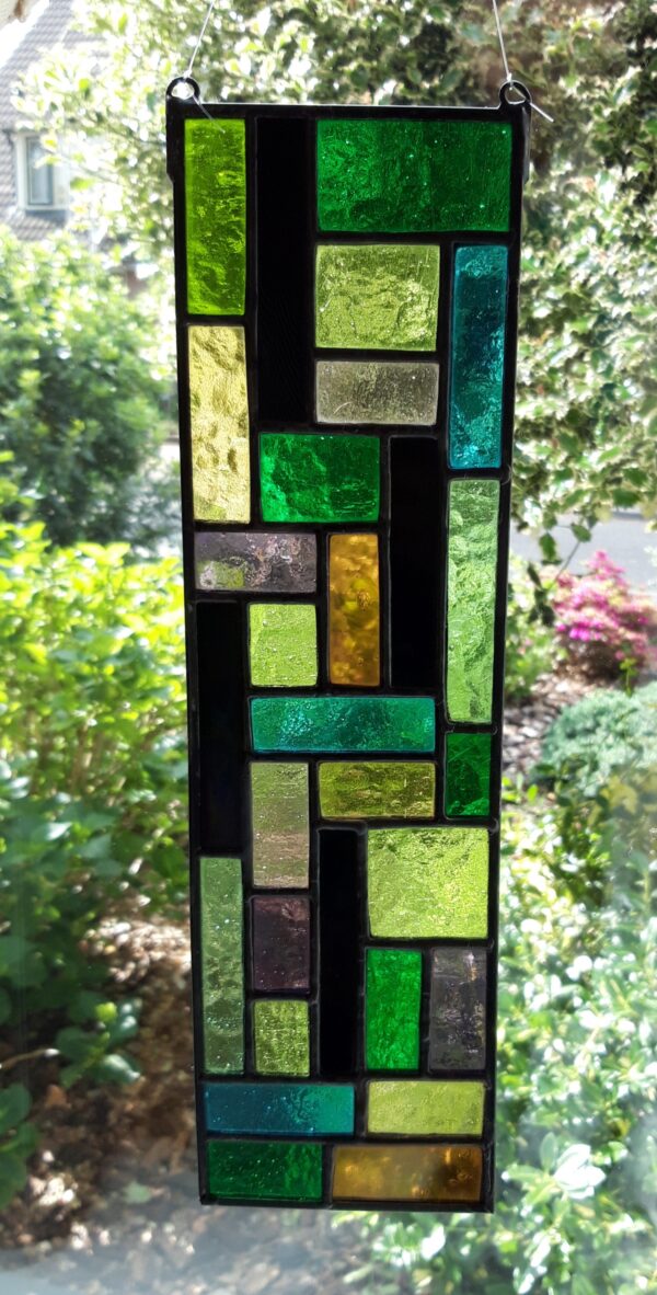 Raamhanger groen, bruin, blauw, geel, paars, zwart